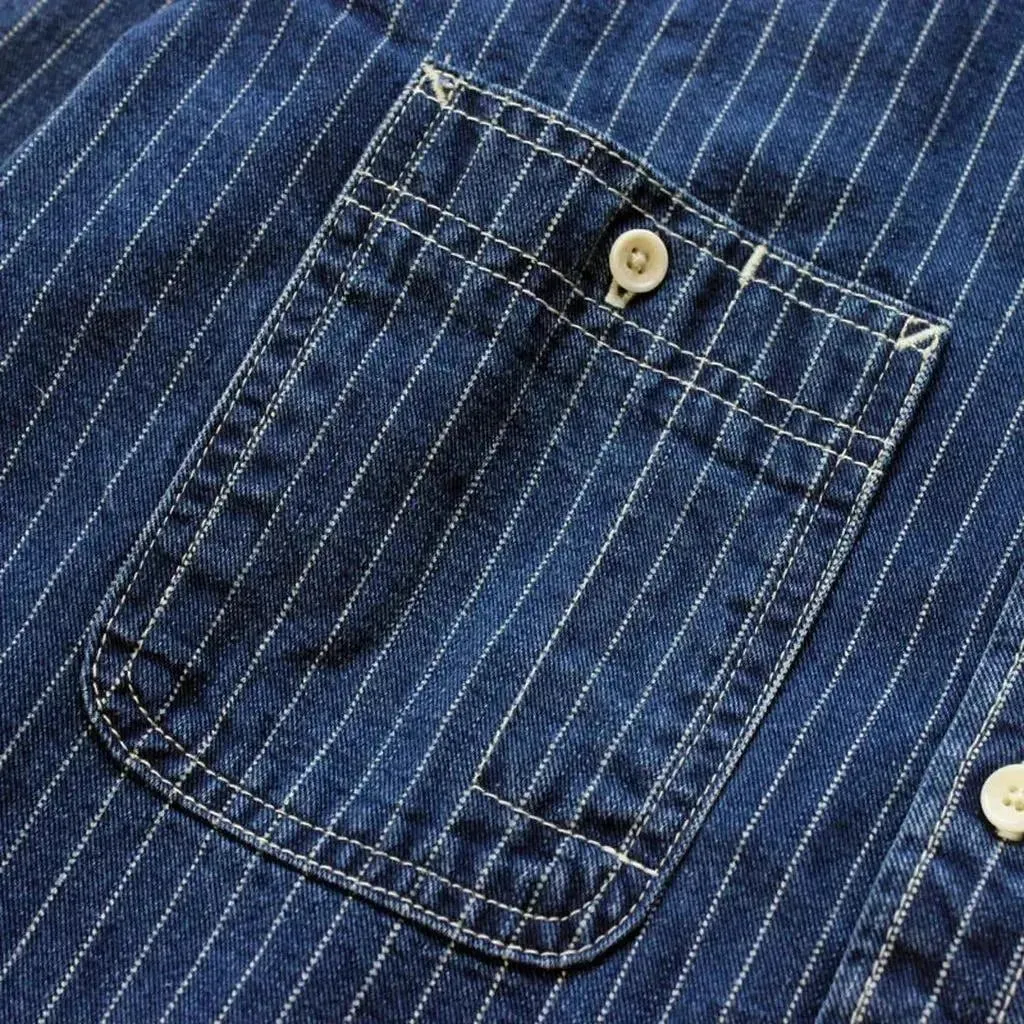 Medium-wash men's denim shirt