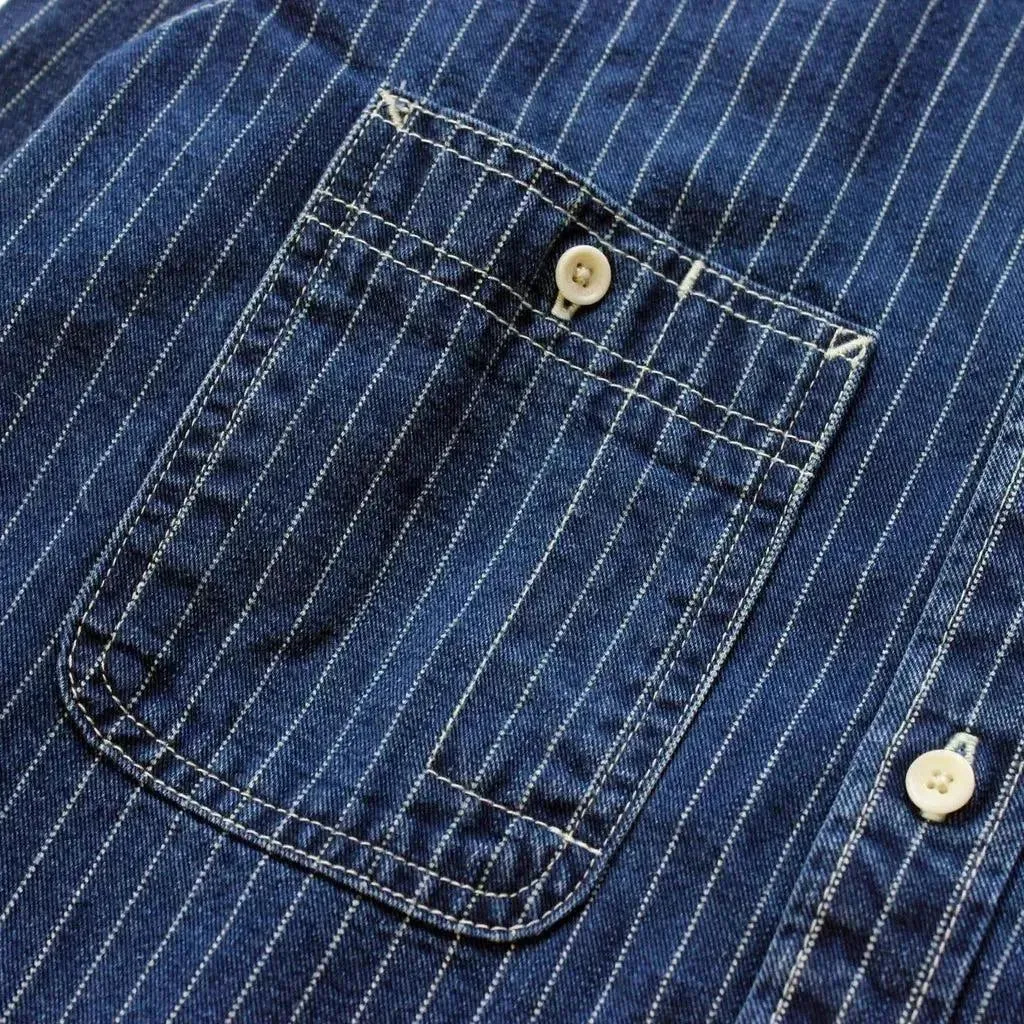 Medium-wash men's denim shirt