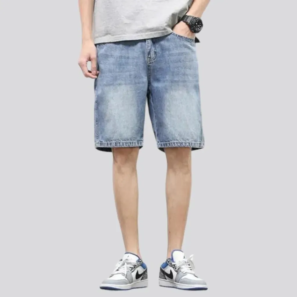 Sanded knee-length jeans shorts