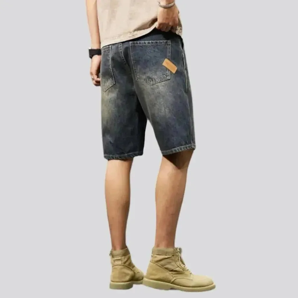 Whiskered dark-wash denim shorts