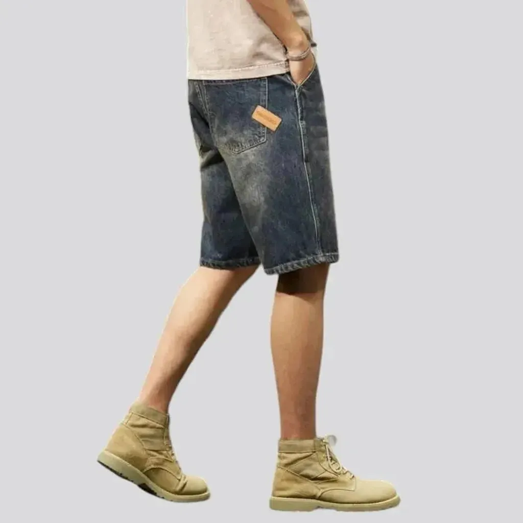 Whiskered dark-wash denim shorts